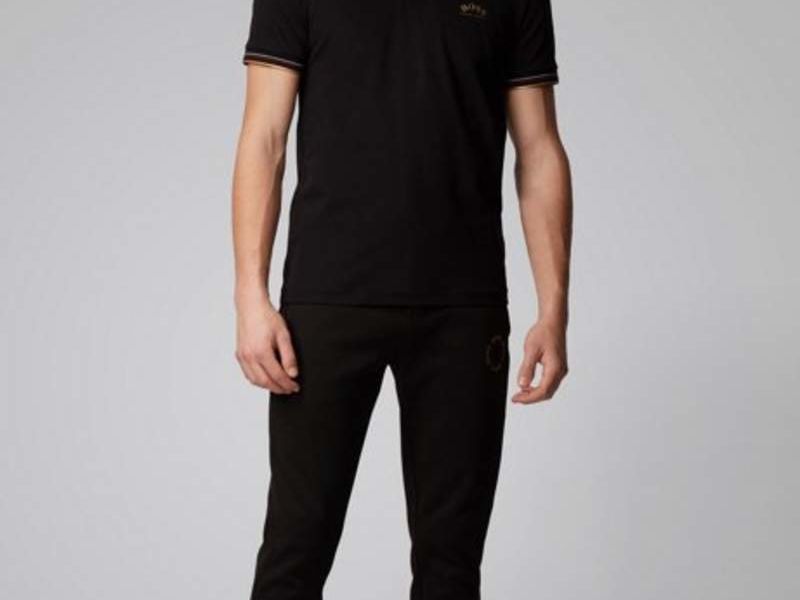 Camisa polo con piqué elástico y logo curvo